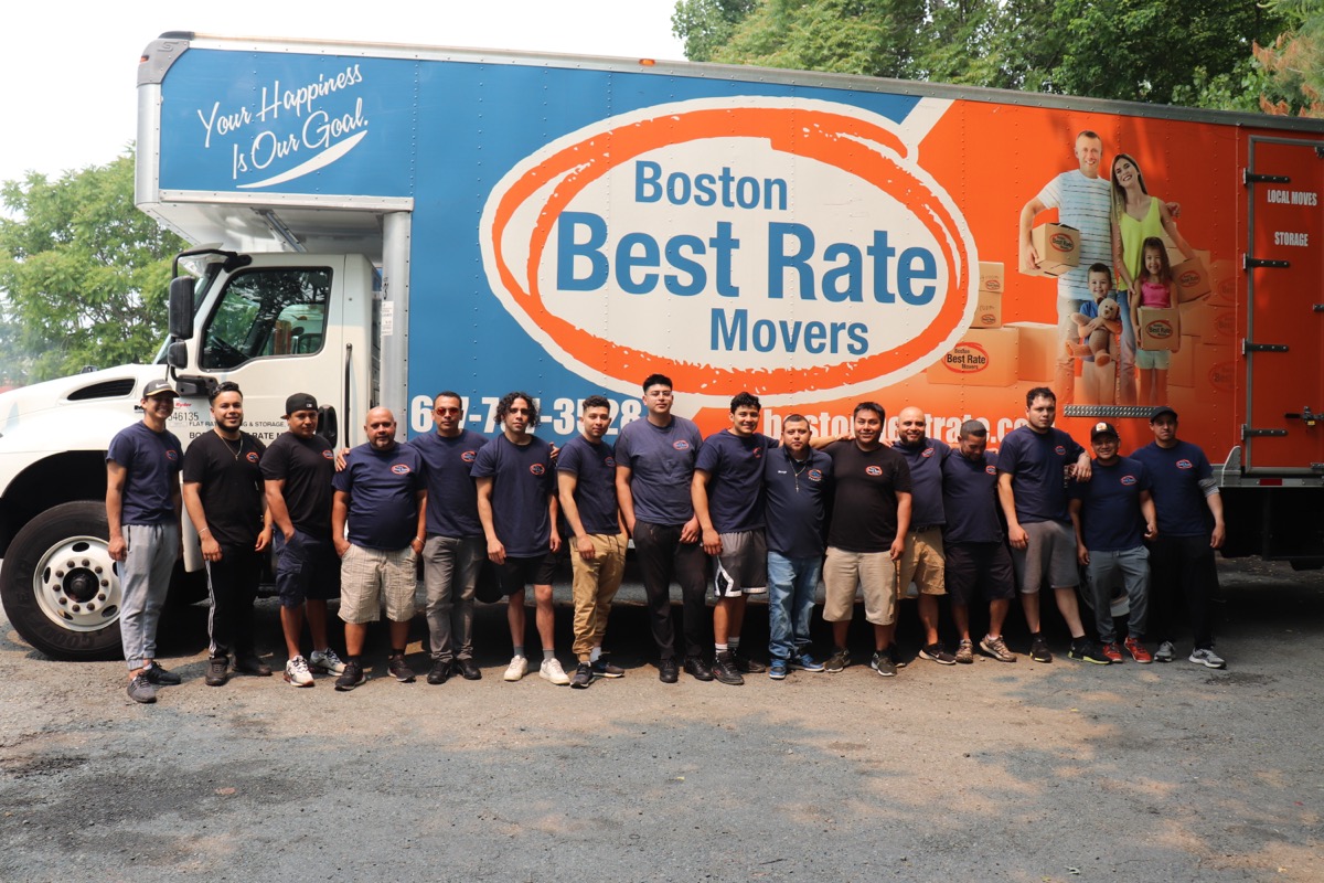 Boston movers — the full Boston Best Rate Movers crew standing in front of a branded moving truck