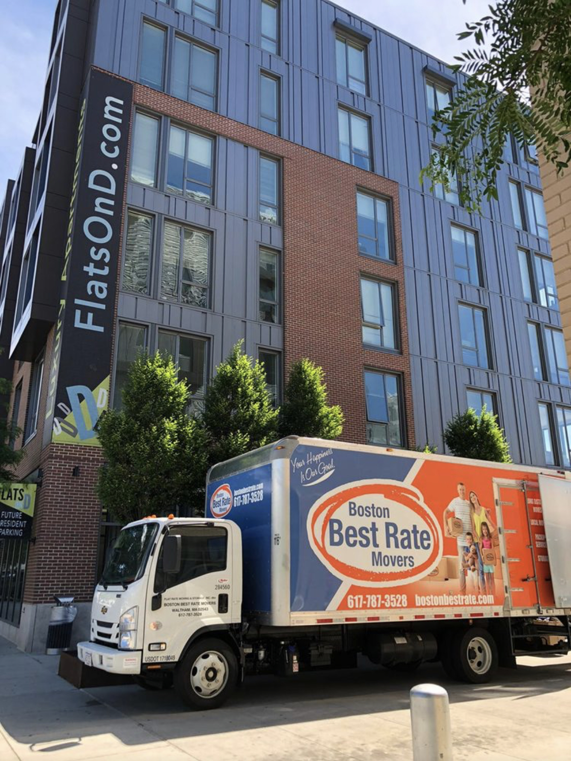 Boston Best Rate Movers truck at an apartment complex in Boston